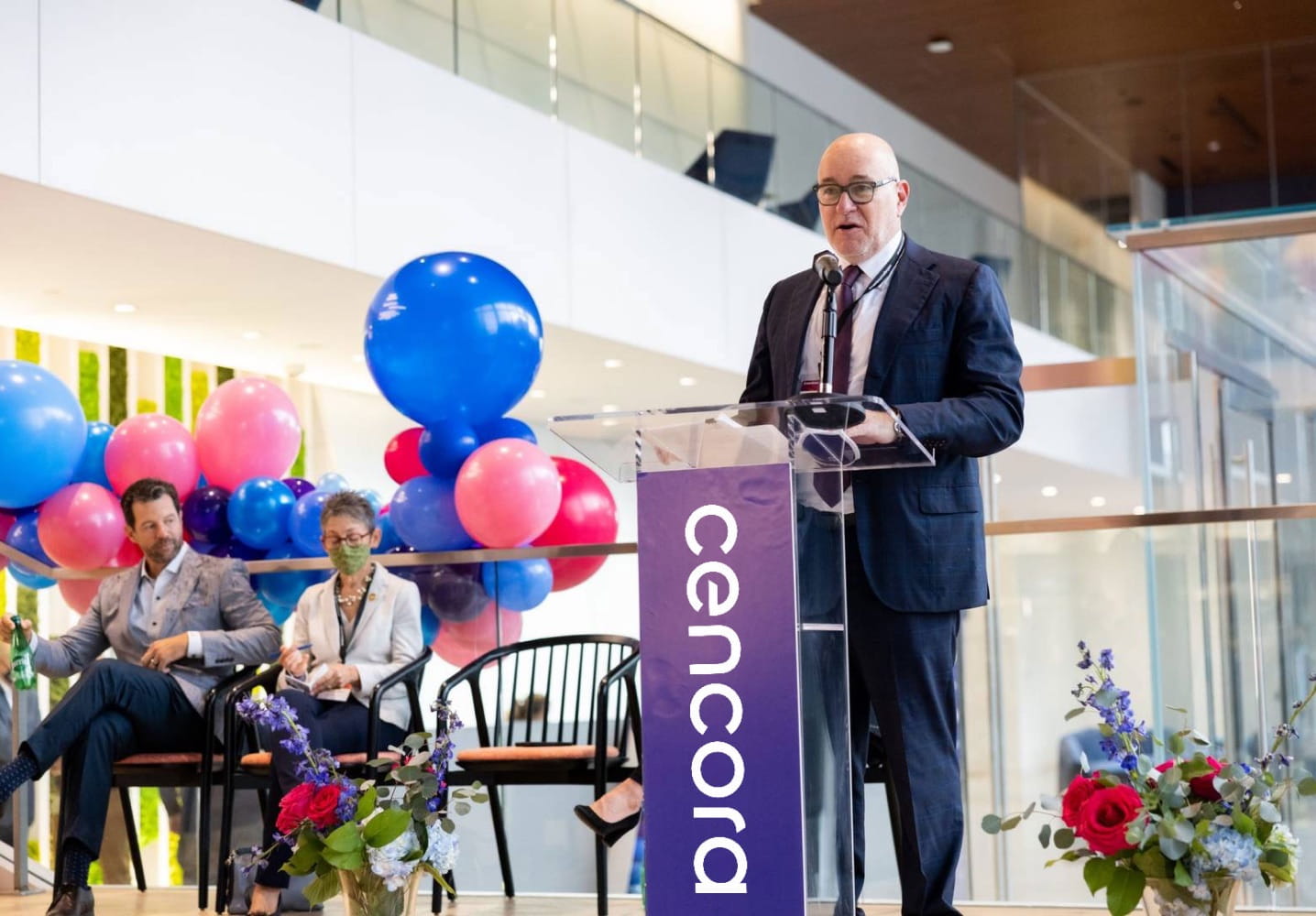 Steve H. Collis, the Chairman, President, and Chief Executive Officer of Cencora, speaking at a podium during a corporate event.